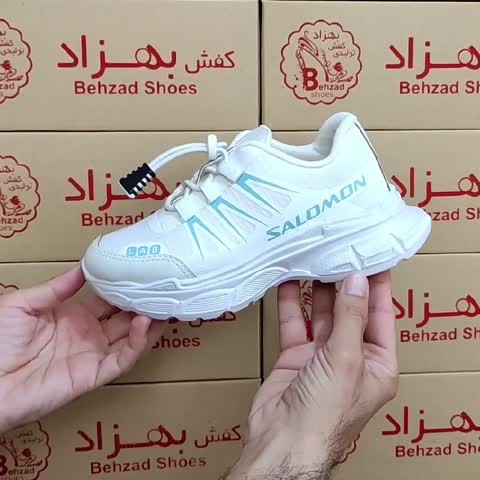 کتونی salomon بچه گانه پسرانه اسپرت سایز 31 تا 36 بند کشی رنگ سفید آبی زیره eva لژ 4 سانتی رویه بافت و چرم مصنوعی