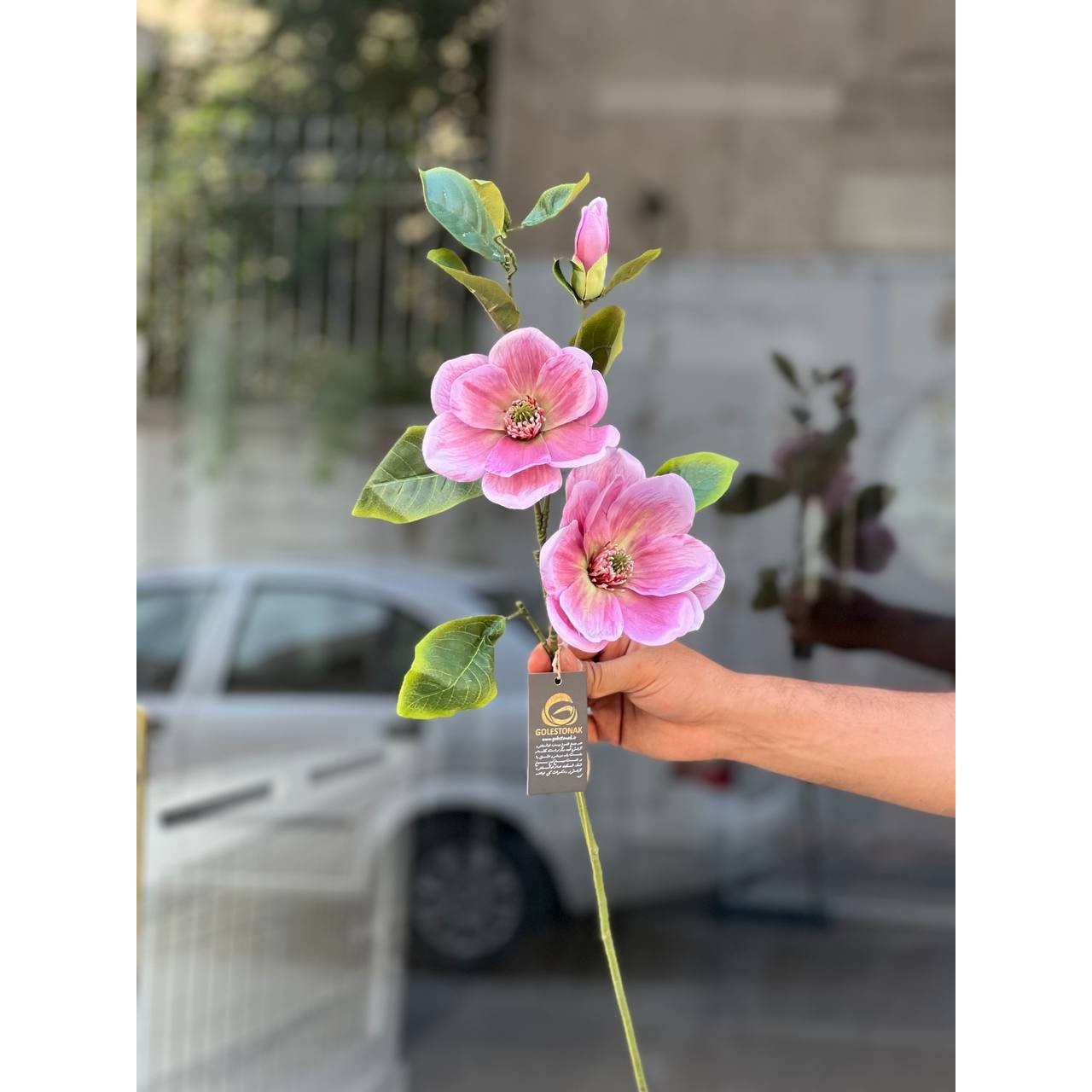 شاخه گل مصنوعی مگنولیا 2گل و یک غنچه رنگ صورتی