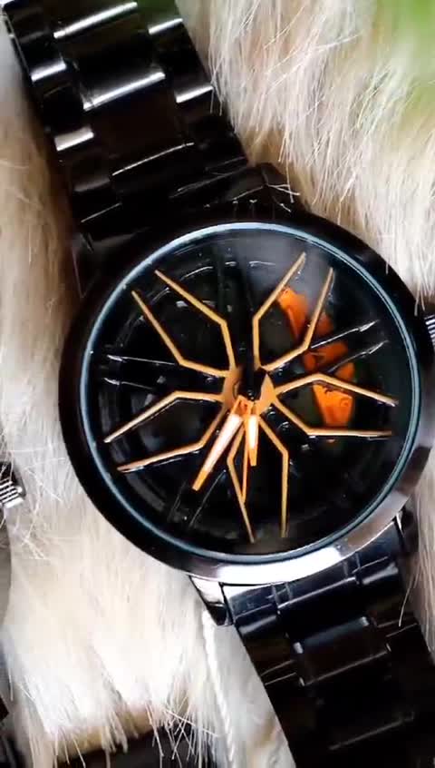 ساعت مچی مردانه صفحه متحرک چرخان طرح رینگ BMW