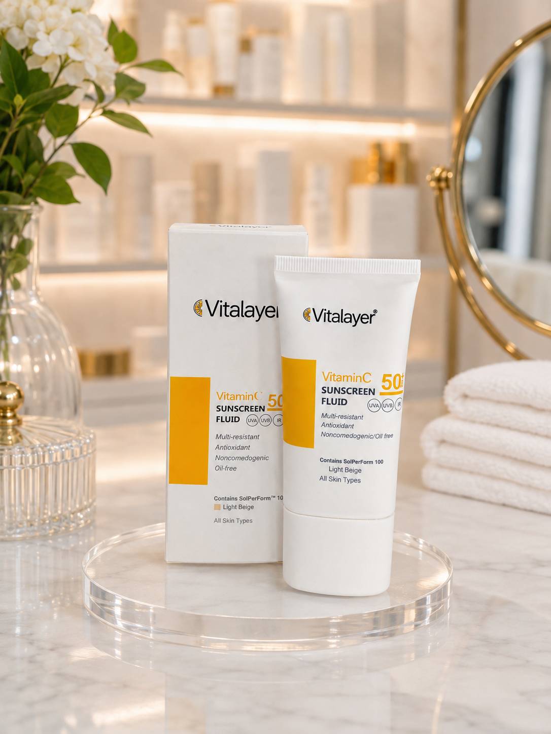 فلوئید ضدآفتاب رنگی ویتالیر 50 SPF مدل Vitamin C مناسب انواع پوست
