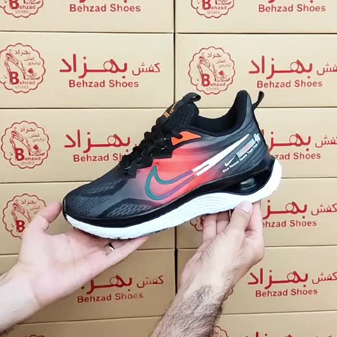 کتونی نایک بافتی مردانه پسرانه رنگ مشکی نارنجی سایز 41 تا 44 زیره کپسولی لژ 4 سانتی کفی طبی رویه بافت خارجی راحت