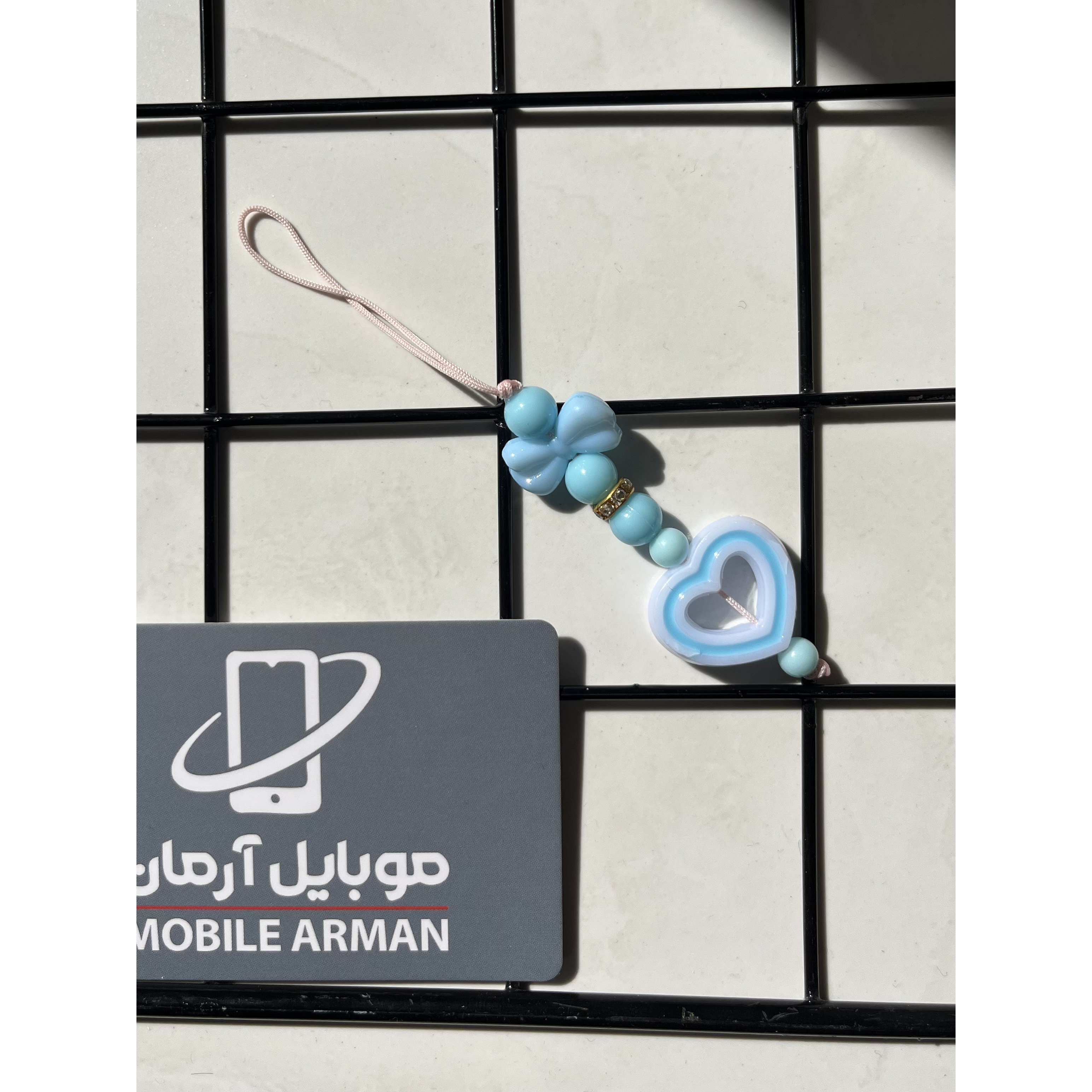 آویز گوشی فانتزی مدل پاپیون و قلب