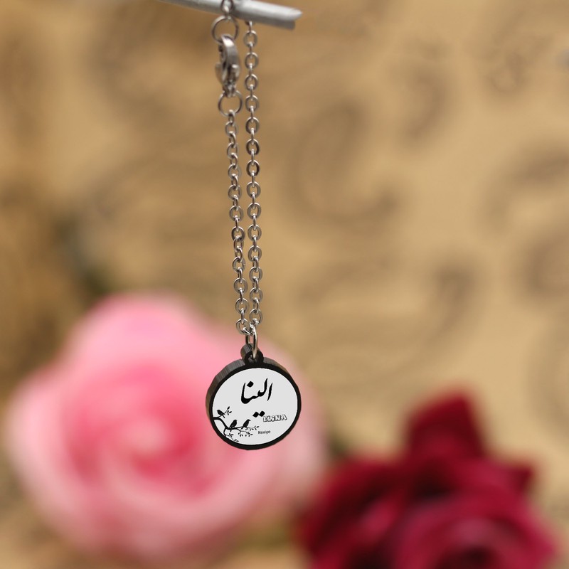 آویز ساعت زنانه ناکسیگو مدل شب تاب طرح الینا کد AW9086