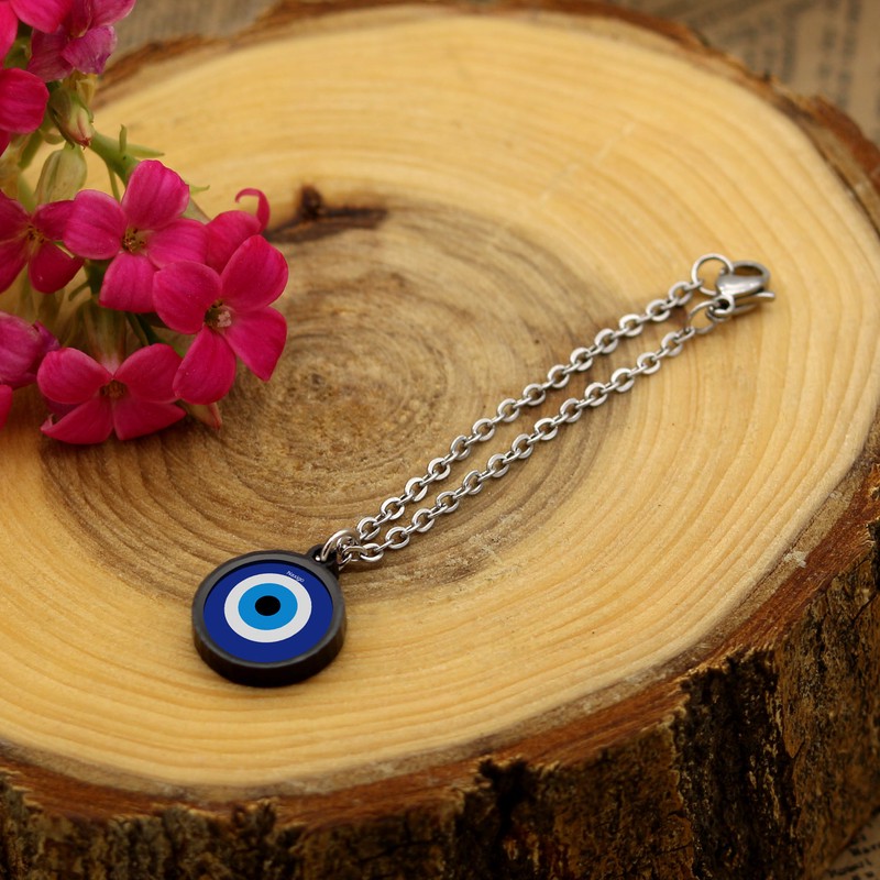 آویز ساعت زنانه ناکسیگو مدل شب تاب طرح چشم نظر کد AW7259