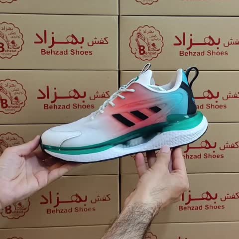 کتونی آدیداس سه خط مردانه پسرانه رنگ سفید سبز نارنجی سایز 41 تا 44 زیره کپسولی لژ 4 سانتی کفی طبی رویه بافت خارجی راحت