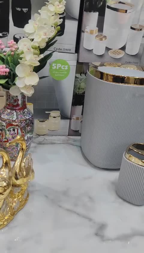 ست سرویس بهداشتی 5 پارچه طرح روما خطی رنگ زیبا و شکیل طوسی روشن طلایی برند کنتراست نو آکبند طرح جدید قیمت عالی واقتصادی
