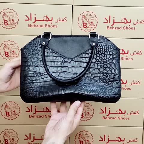 کیف دستی تمام چرم طبیعی گاوی درجه یک زنانه دخترانه رنگ مشکی دوخت ماشینی  تک خانه کیفیت عالی