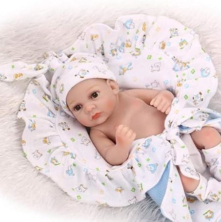عروسک نوزاد ریبورن 25 سانتیمتری به همراه لحاف طراحی طبیعی و واقعگرایانه