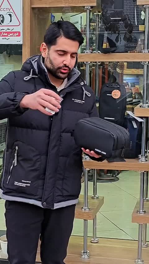 کیف دستی مردانه ضد آب گرین لاین جنس اسکین سیلیکون خارجی سه خانه