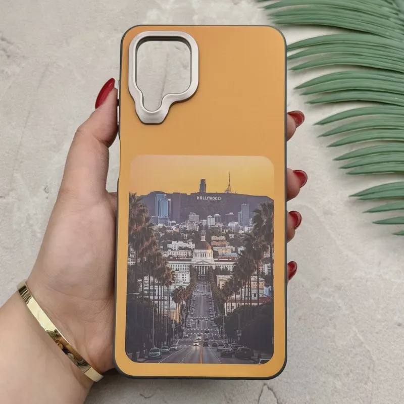 قاب گوشی Galaxy A12 - M12 سامسونگ فانتزی اسپرت HARD لنز سیلور طرح HOLLYWOOD کد 156586