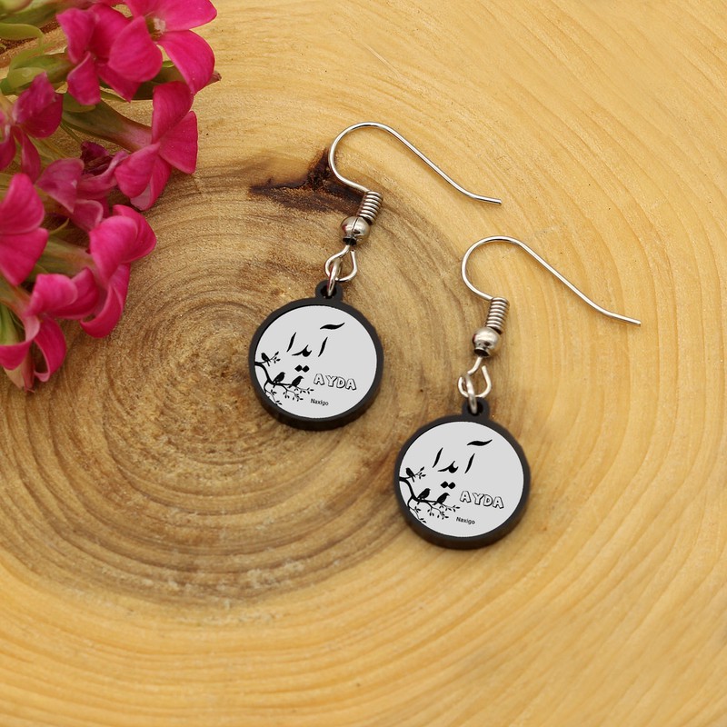 گوشواره زنانه ناکسیگو مدل شب تاب طرح آیدا کد ES8504