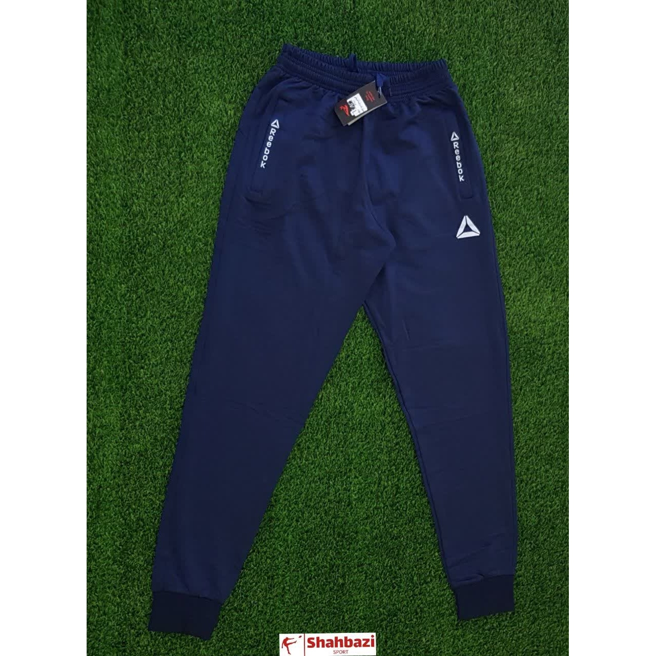 شلوار ورزشی پارچه فلامنت غواصی دمپا کش-برند ریباک-در دو رنگ