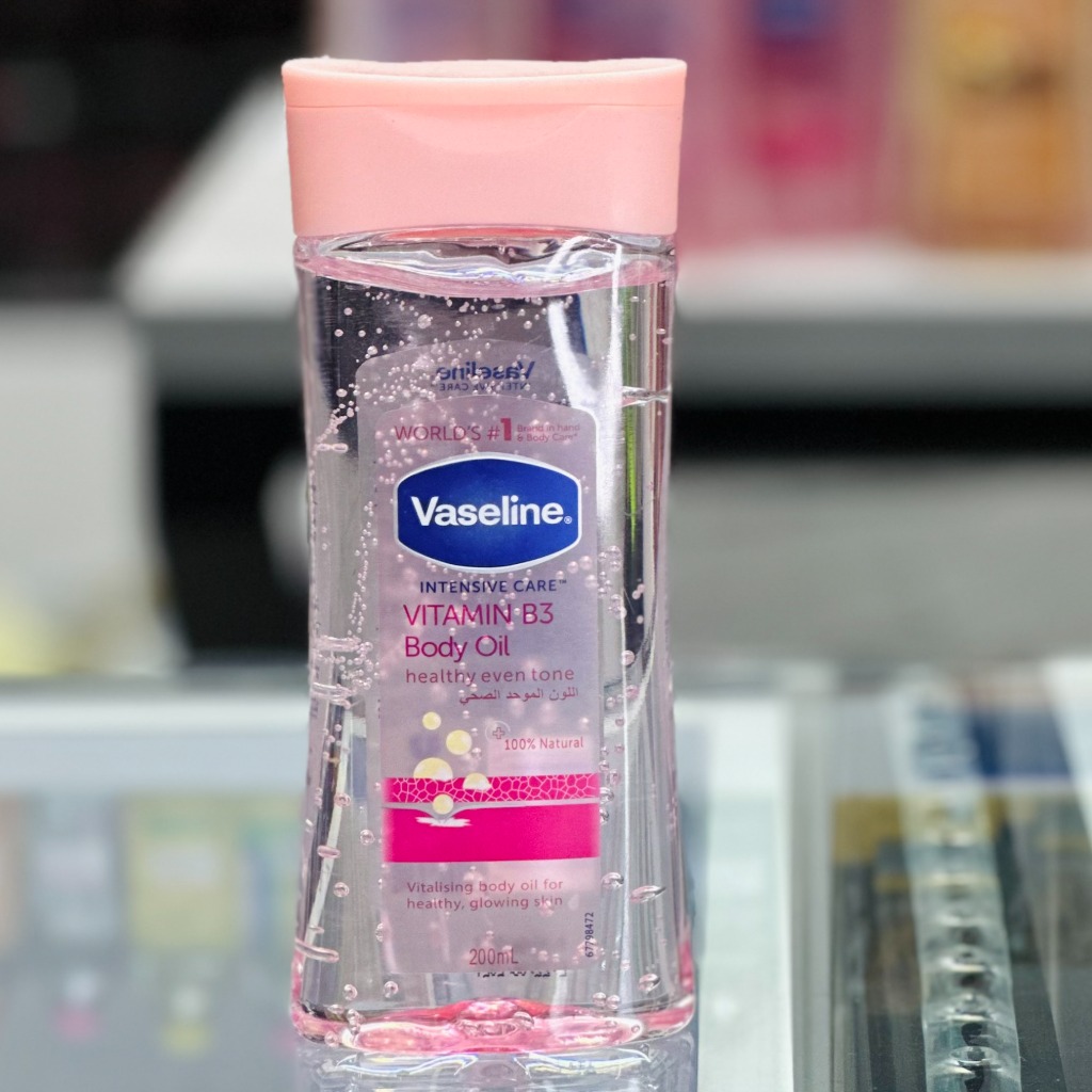 روغن بدن وازلین ویتامین B3 صورتی 200ml Vaseline Vitamin B3 Body Oil 200ml