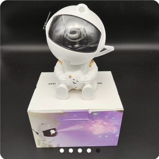 چراغ خواب پروژکتور کهکشانی مدل فضانورد نشسته ا Starry Sky Projector LED Astronaut Light Laser