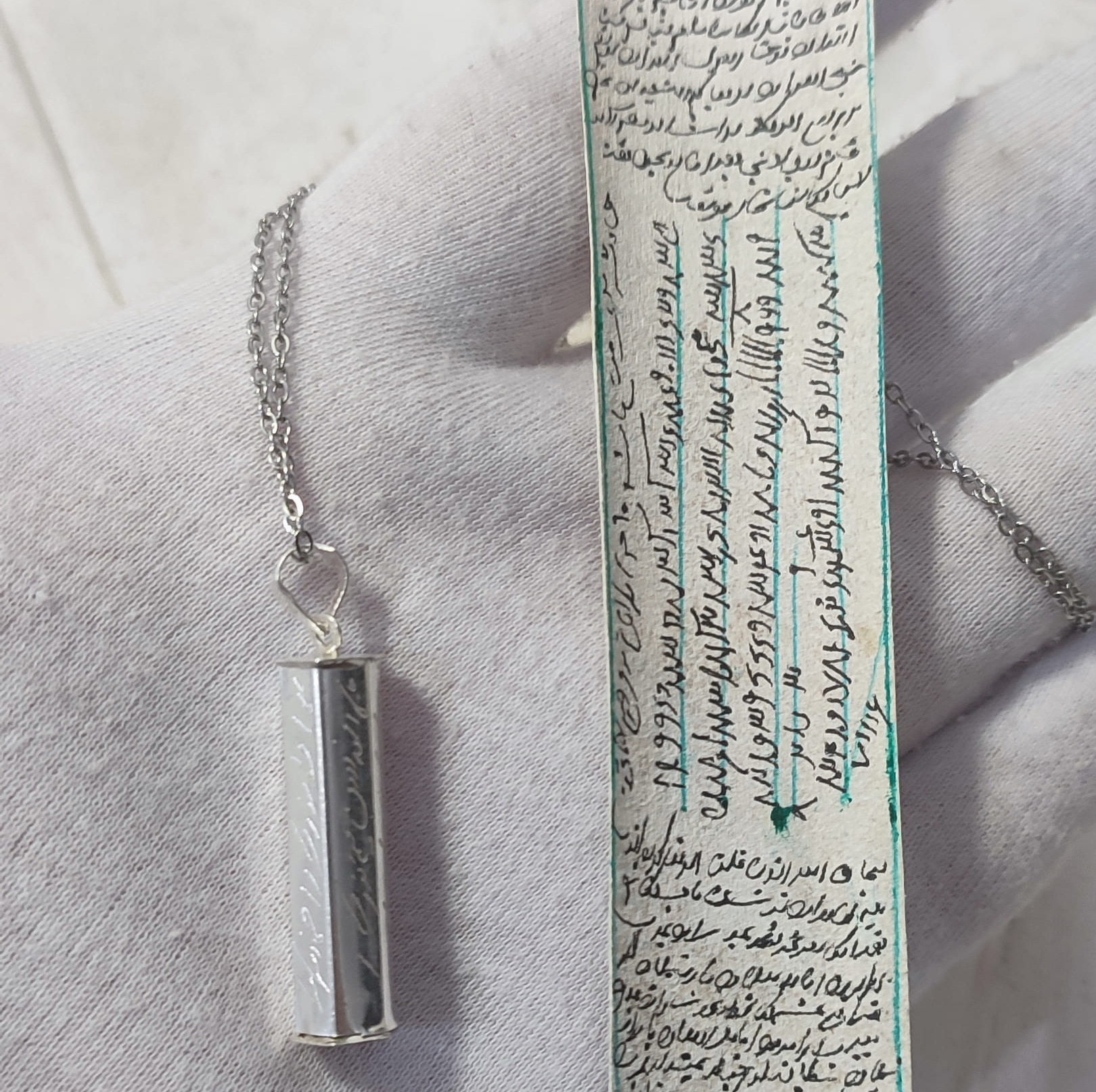 حرز امام جواد با لول نقره شش ضلعی (همراه با زنجیر استیل و بند چرمی)جدید