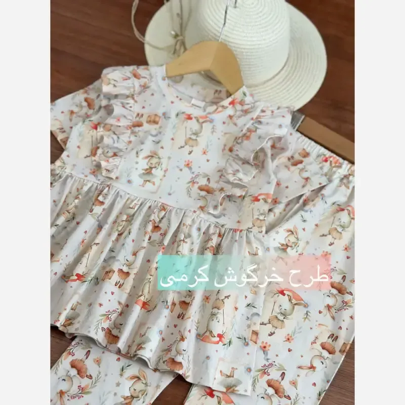 ست بلوز و شلوار راحتی دخترانه پنبه یک رو لاکرا مدل خرگوش کرم سایز 40 تا 60جدید