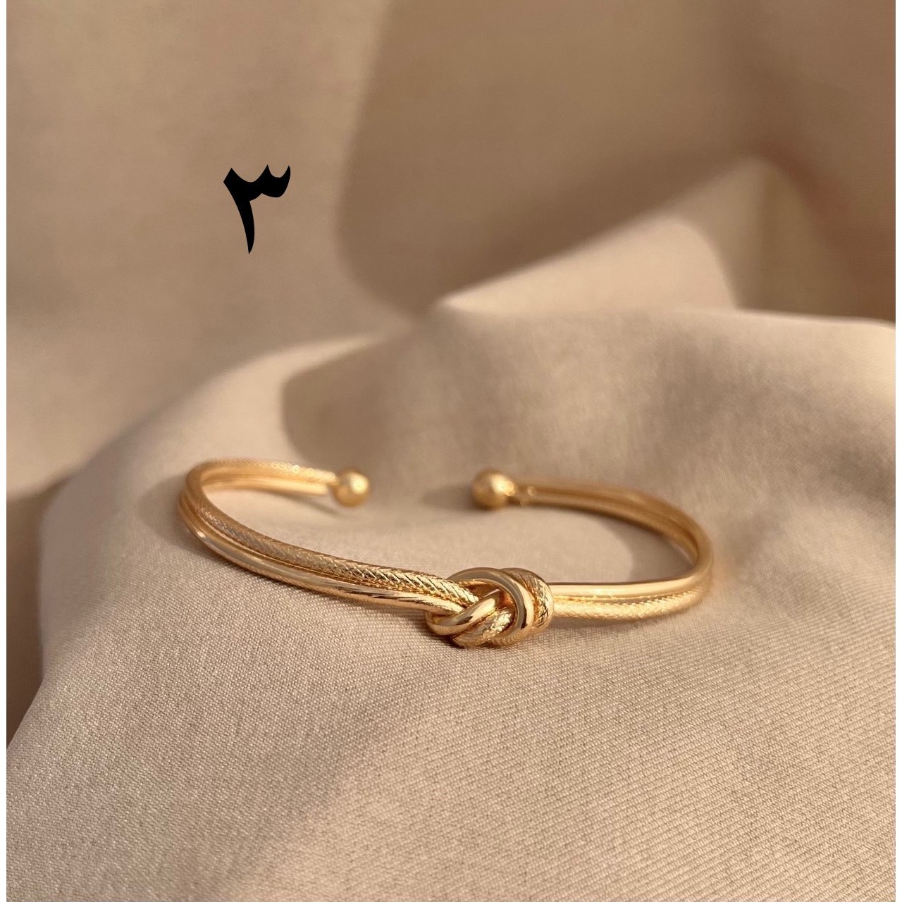 بنگل گره تراش دار طلایی و نقره ای