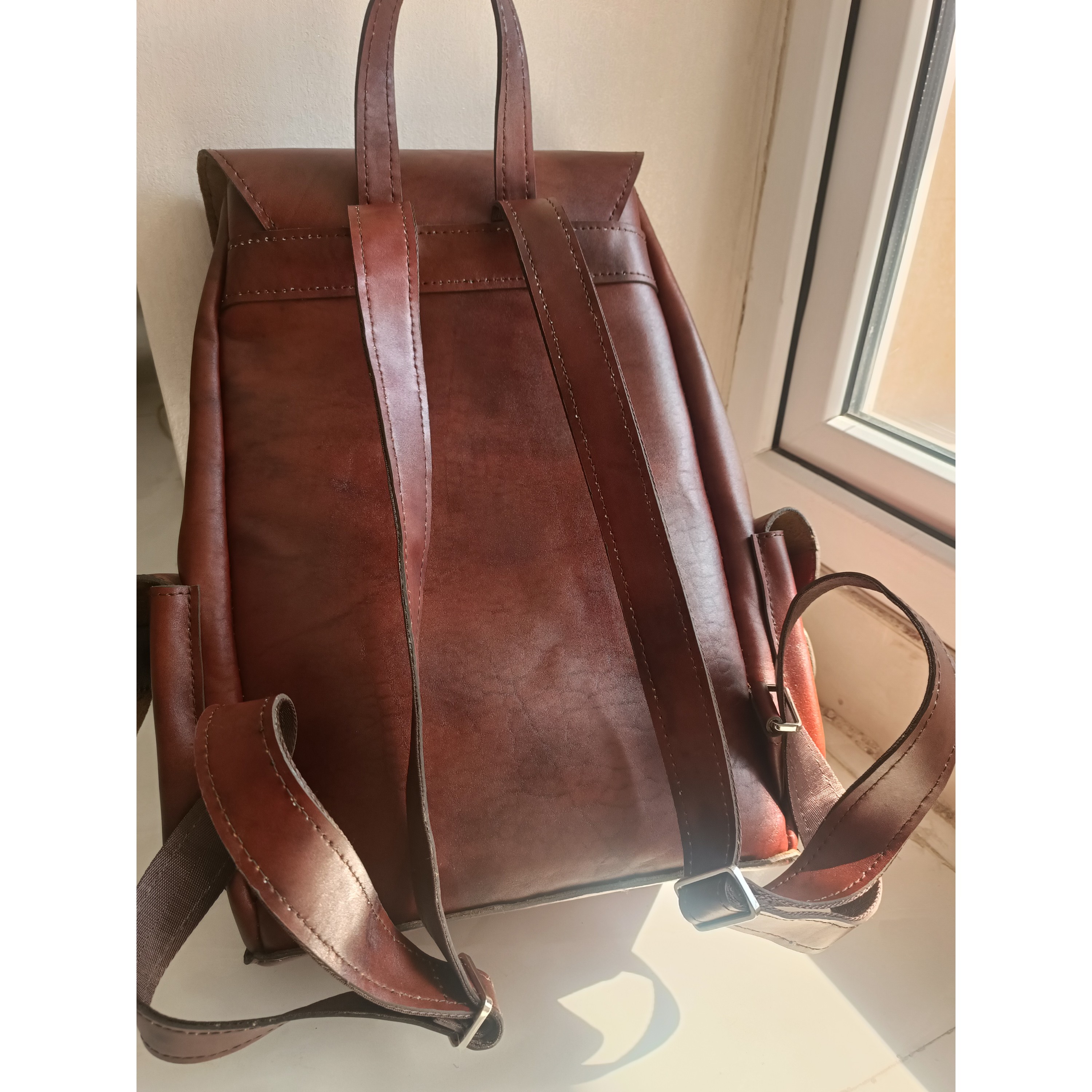 کوله پشتی چرم طبیعی گاوی