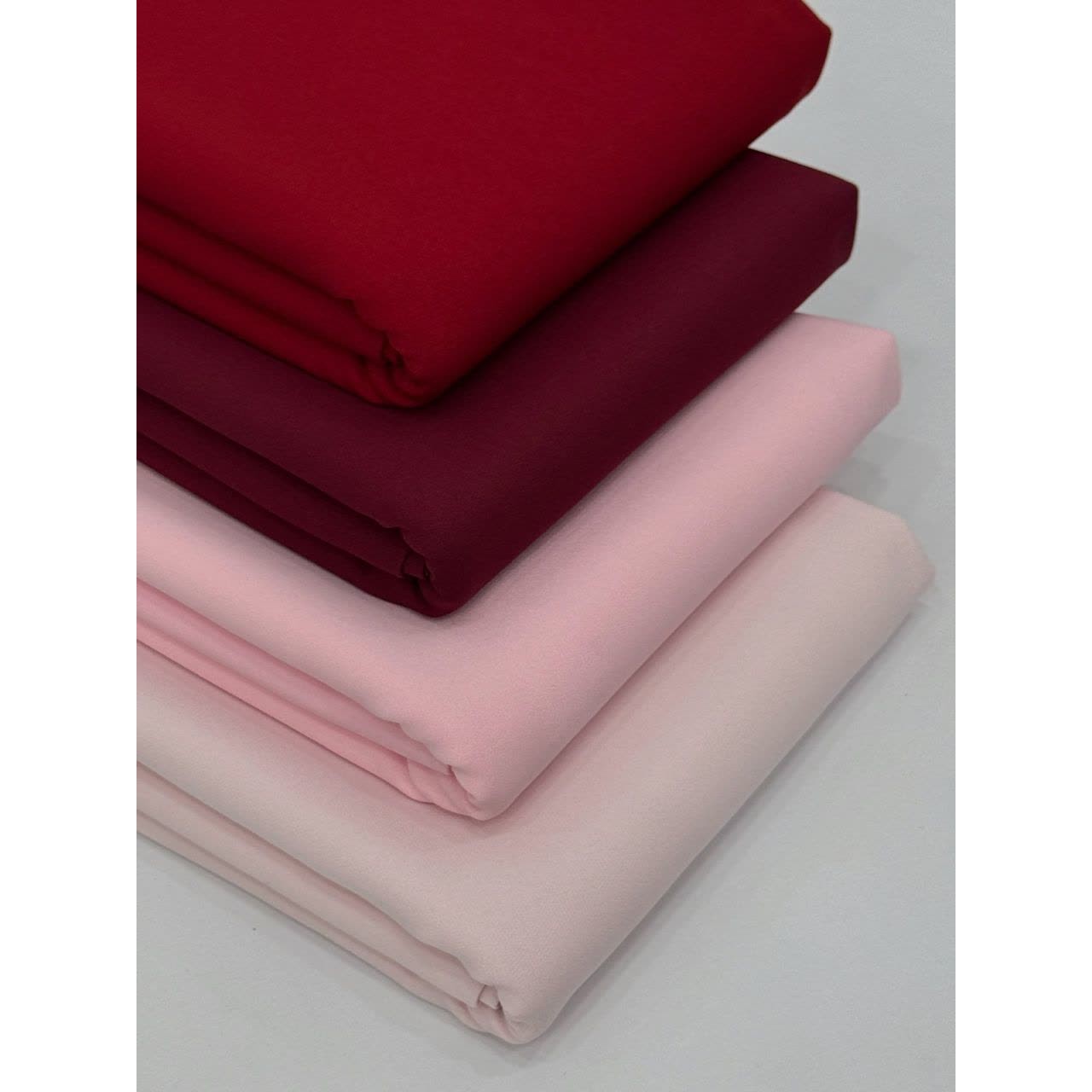 پارچه کرپ فیس باربی درجه یک عرض 1.5 (گ)