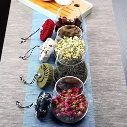 بانکه شیشه ای درب پارچه ای