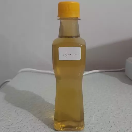 روغن سیر سیاه خوراکی اصل و خالص ربع لیتری (پرپشت کننده مو پرپشت کننده ابرو تقویت مژه تقویت ریش و سبیل )