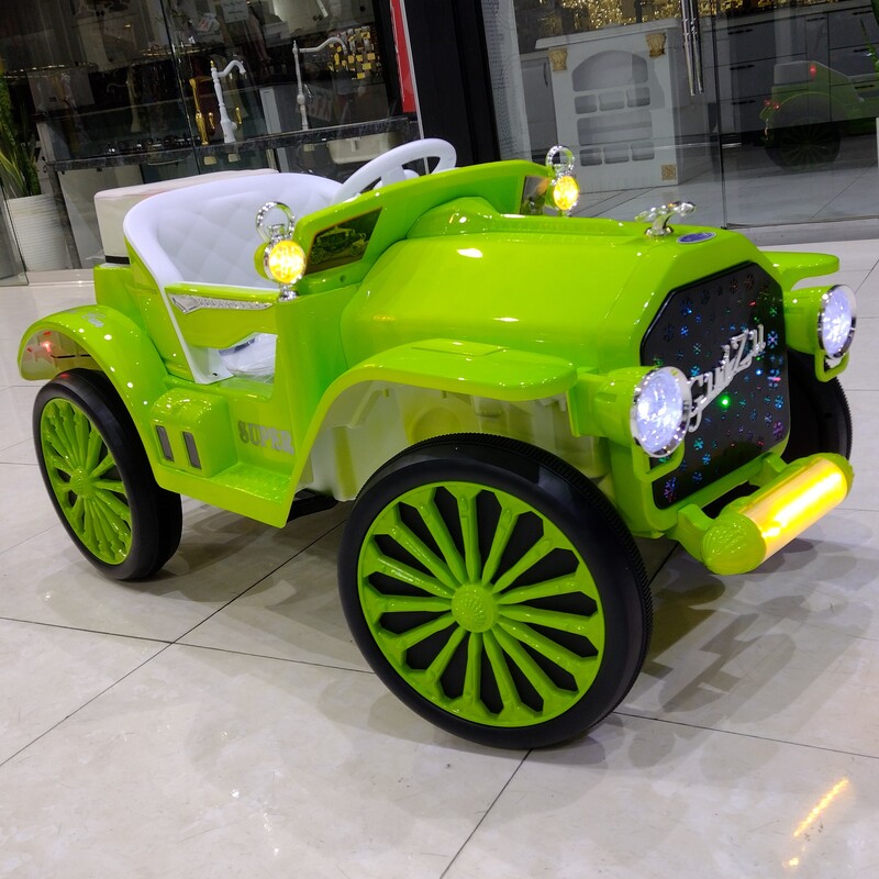ماشین شارژی کلاسیک سبز متالیک دونفره  صندلی چرم چهارموتور