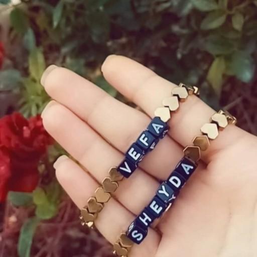  ارسال رایگان دستبند حدید قلب طلایی با حروف اسم شما