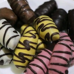 شکلات خرمایی  تنگسیر یک کیلویی در شش طعم موز.توت فرنگی.شیری.کاکائویی.نسکافه و تلخ