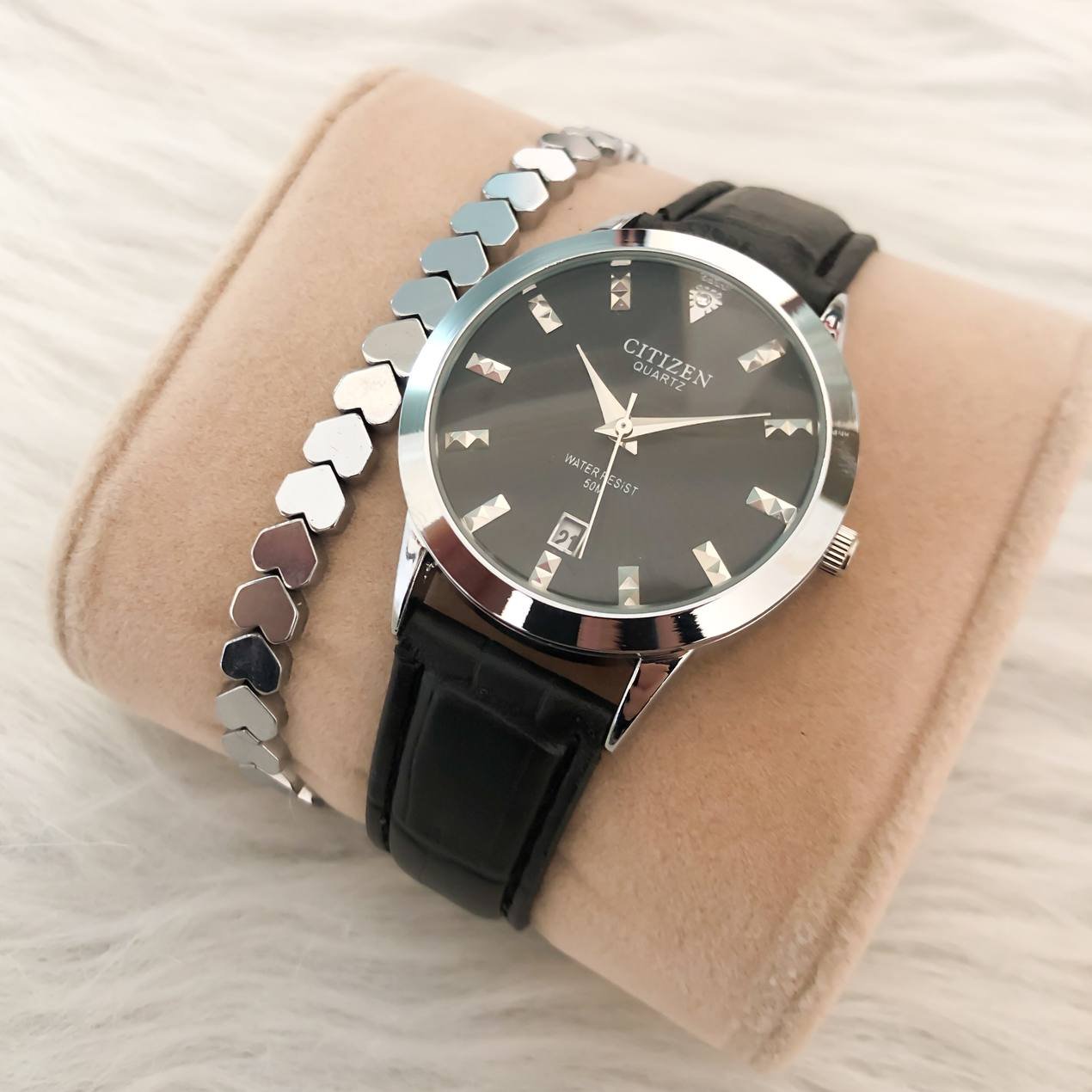 ساعت زنانه بندچرمی بهمراه دیتبند حدید