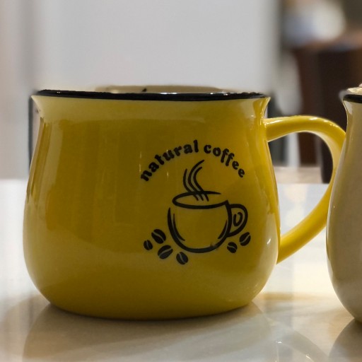 ماگ سرامیکی مارک رجینال گنجایش 300 رنگ زرد طرح فنجان قهوه