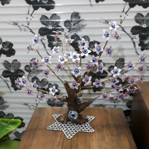 درختچه زینتی با گلهای صورتی