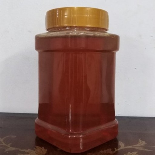 عسل کوهی استخدوس طبیعی رنگ تیره شهد نوش (یک کیلویی)