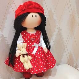 عروسک روسی دختر با موهای ویو مشکی و لباس خالخالی و قد 35 سانتی