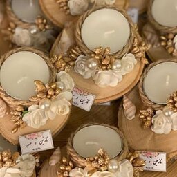 گیفت عقدو عروسی چوبی با شمع و گل سفید و نقره ای