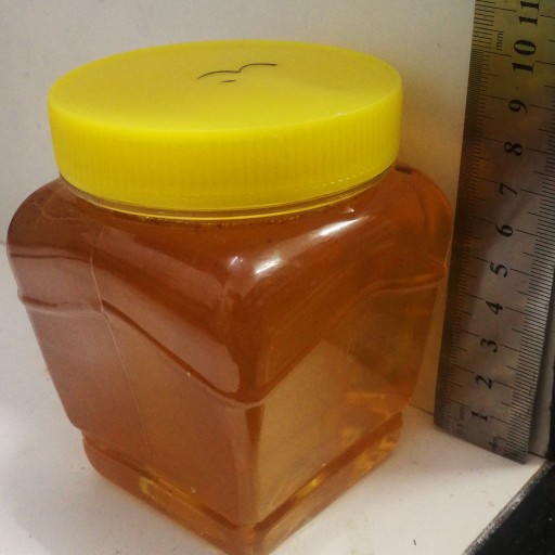 عسل چهل گیاه 100 درصد طبیعی نیم کیلویی