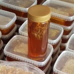 عسل گون با موم  استاندارد ظرف استوا نه (یک کیلویی) ارسال رایگان