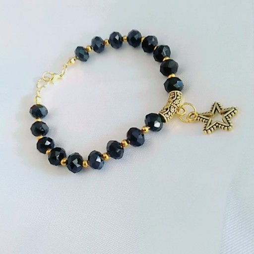 دستبند مهره کریستالی سیاه براق با آویز ستاره