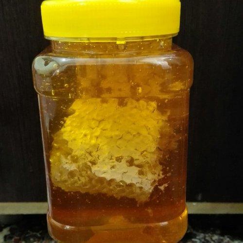 عسل طبیعی چند گیاه 1 کیلویی موم دار