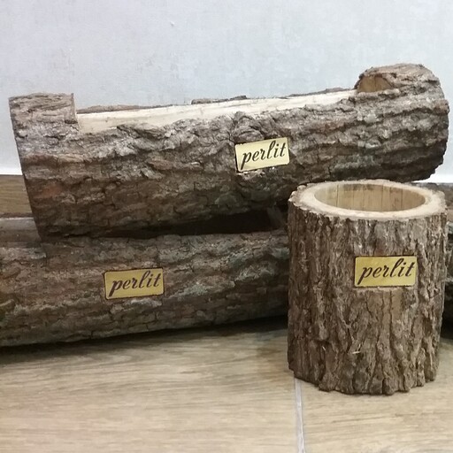 گلدان چوبی طبیعی ساخته شده با تنه درخت صنوبر 