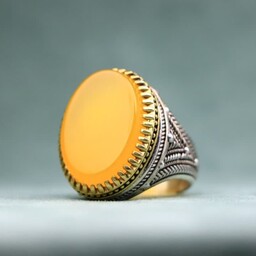 انگشتر نقره مردانه عقیق زرد شرف الشمس با( رکاب طرح تاج برنجی)