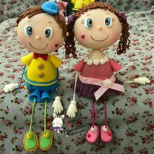 عروسک خمیری دست و پاکشی دختر و پسر