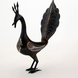 مجسمه فولادی  طاووس نقره کوب دست ساز  برای دکوراسیون