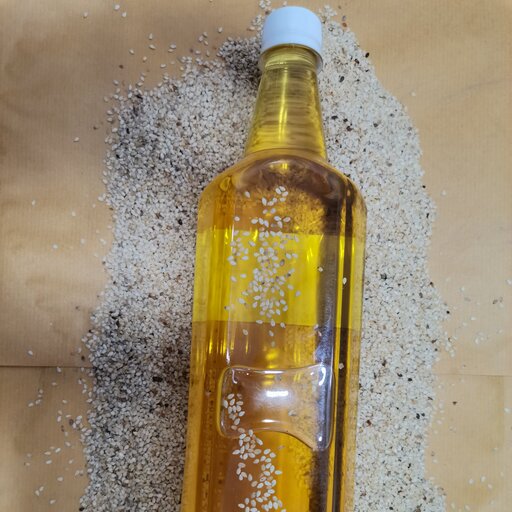 روغن کنجد یک لیتری  اصل درجه یک  اعلا (عطاری و محصولات ارگانیک طراوت)