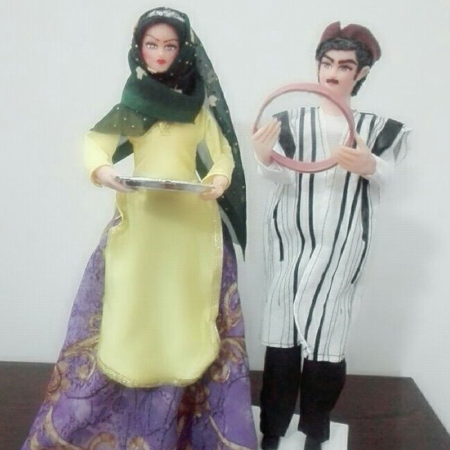 مجسمه زن و مرد بختیاری (پس کرایه)