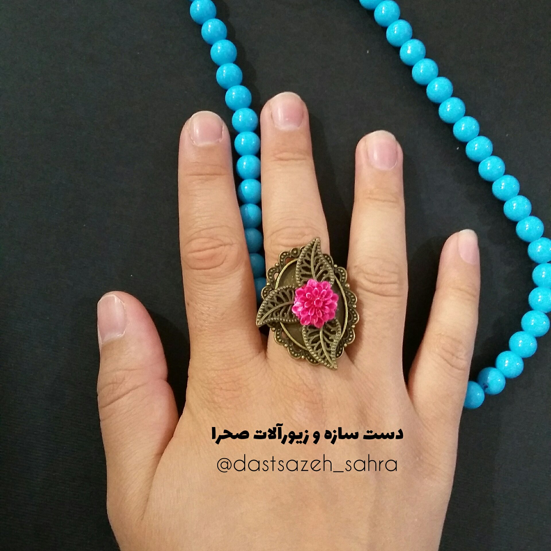 انگشتر گل برنزی با طرح فانتزی گل صورتی و برگ برنزی