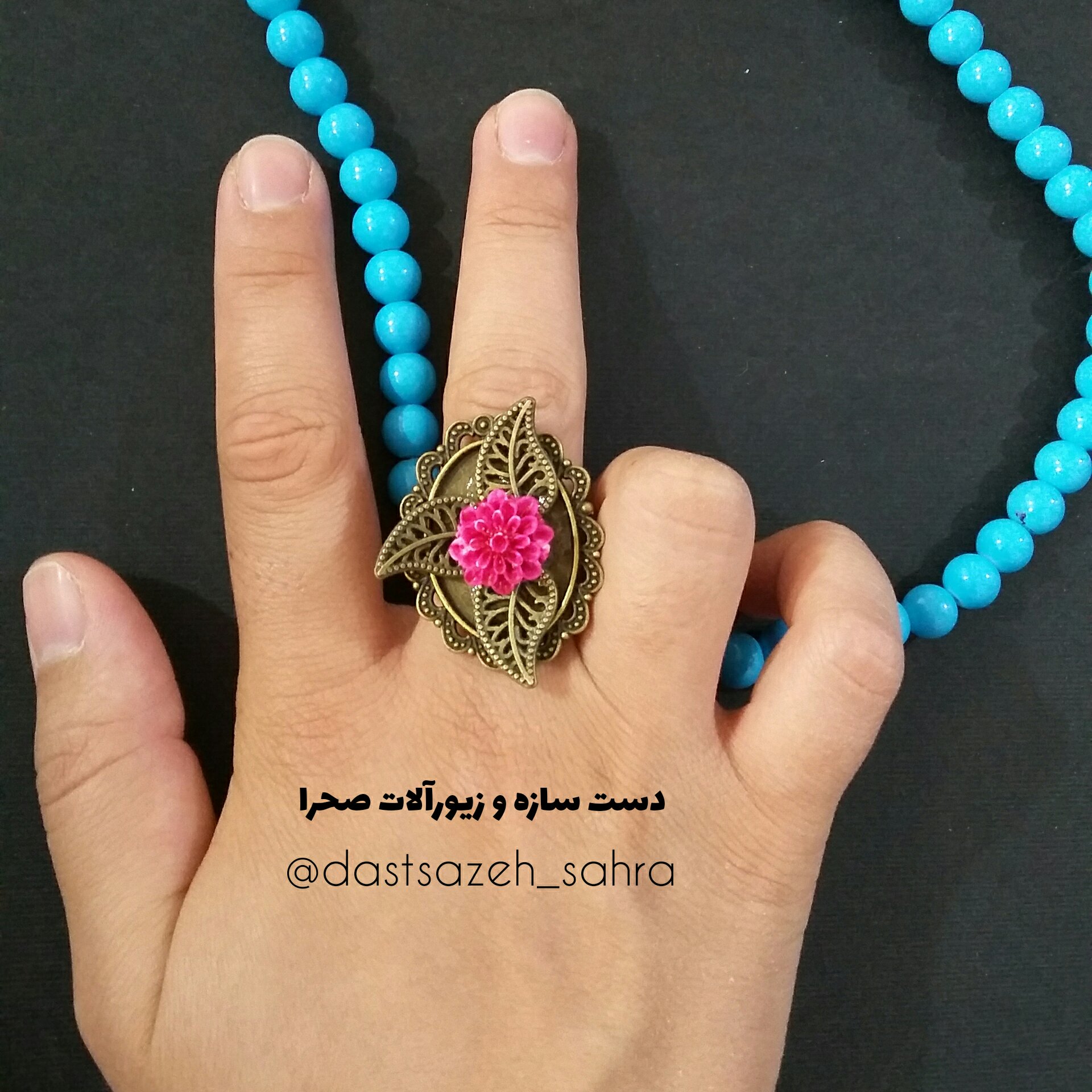 انگشتر گل برنزی با طرح فانتزی گل صورتی و برگ برنزی