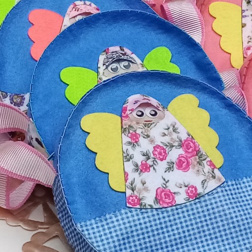 کیفهای نمدی زیبا در رنگهای مختلف برای کودکان و نوجوانان از جنس نمد، دارای طراحی زیبا و سبک، قابل حمل با طرح فرشته حجاب در رنگهای متنوع و شاد