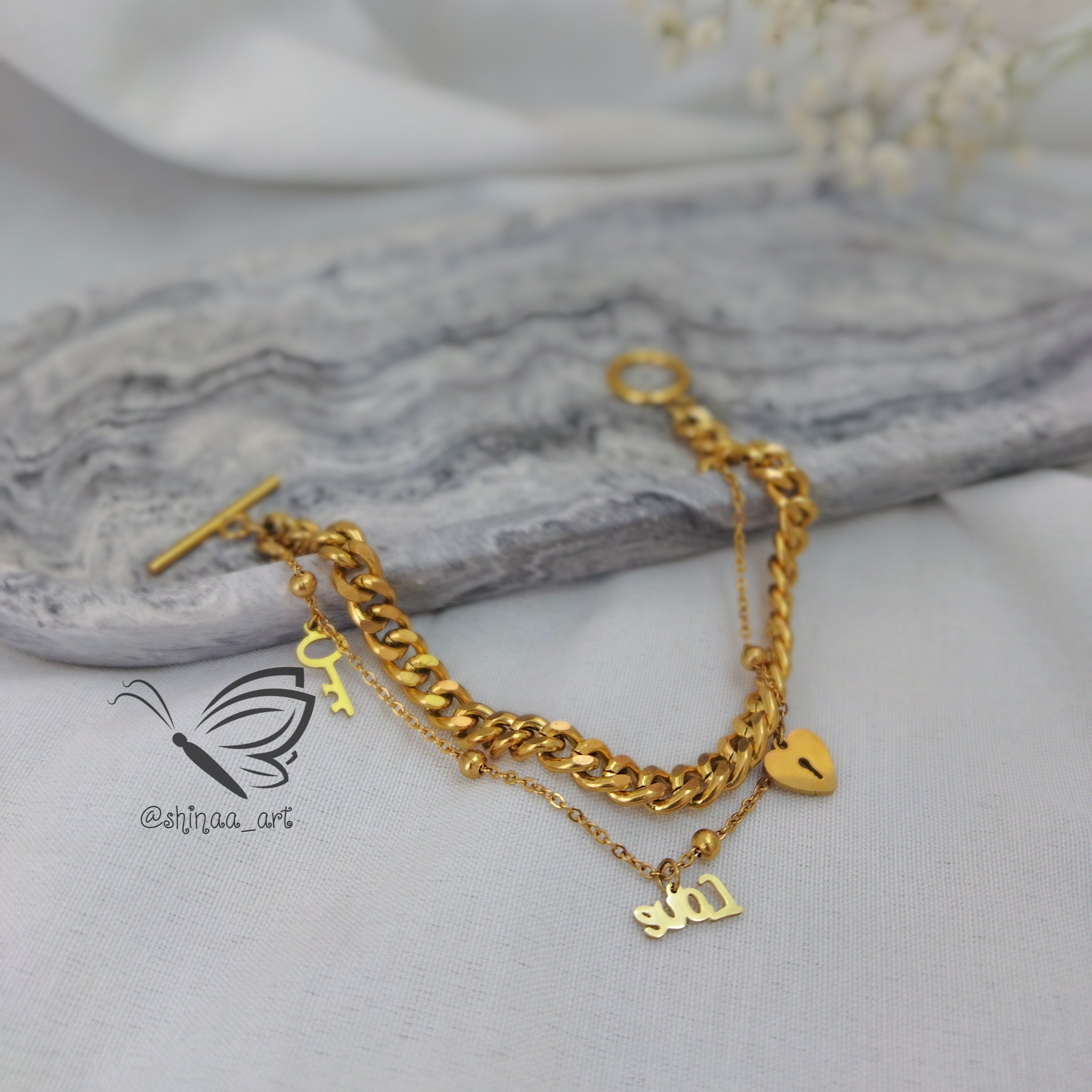 ست دستبند کارتیه دورج و آویز ساعت استیل طرح عشق با آویزهای استیل