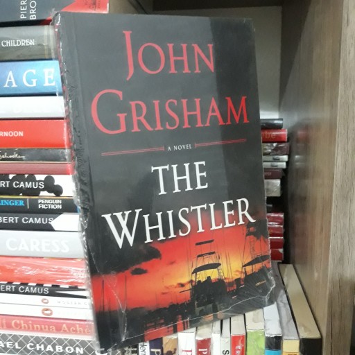 کتاب زبان اصلی The Whistler (افشاگر)