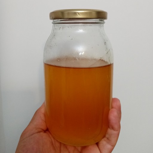 عسل بهارنارنج با بسته بندی شیشه ای یک کیلویی